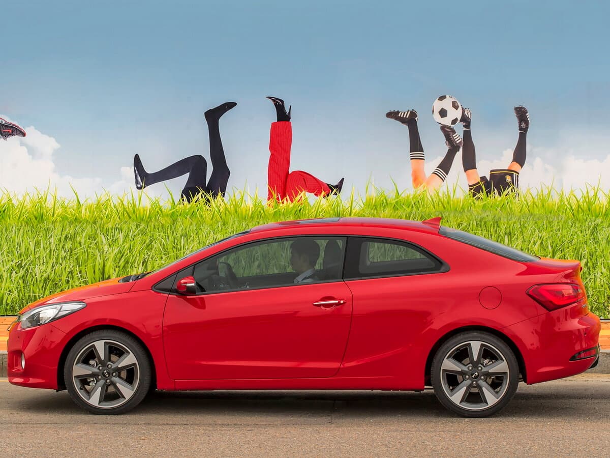 Kia Cerato III — Yandan