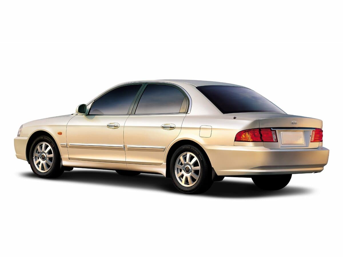 Kia Optima I — 3/4 arxadan