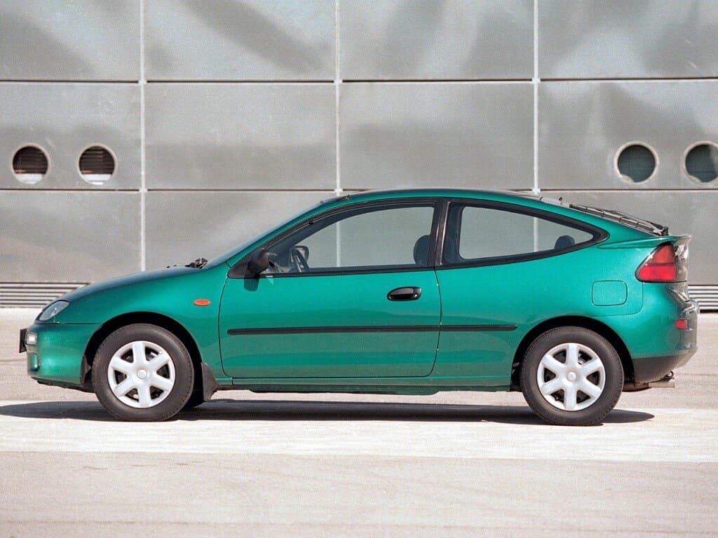 Mazda 323 V (BA) — Yandan