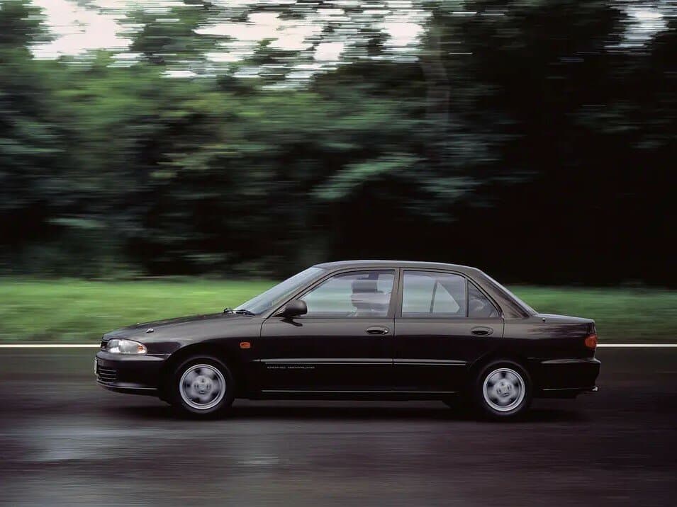 Mitsubishi Lancer VI — Yandan