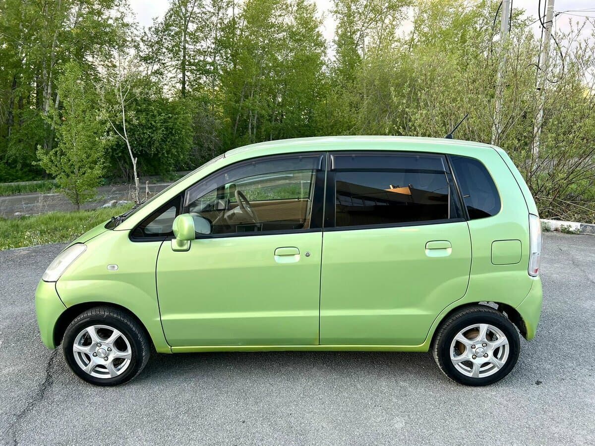 Nissan Moco I — Yandan