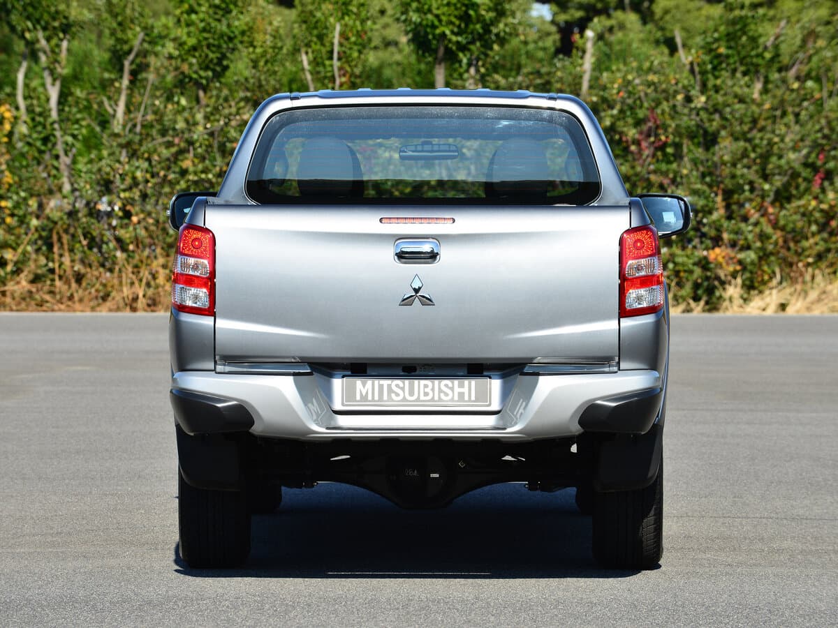Mitsubishi Triton V — Arxadan