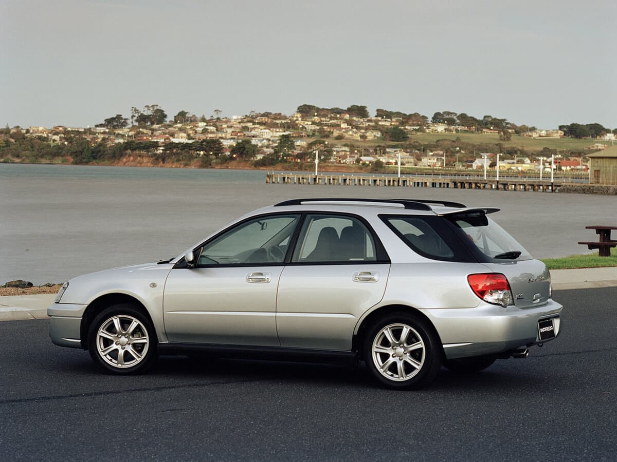 Subaru Impreza II Restayling 1 — Yandan