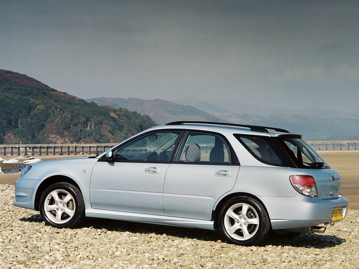 Subaru Impreza II Restayling 2 — Yandan